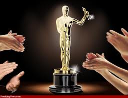 oscar statue with clapping hands